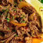 Crock Pot Shredded Mexican Beef served with limes is easy to make and great for so many dishes!