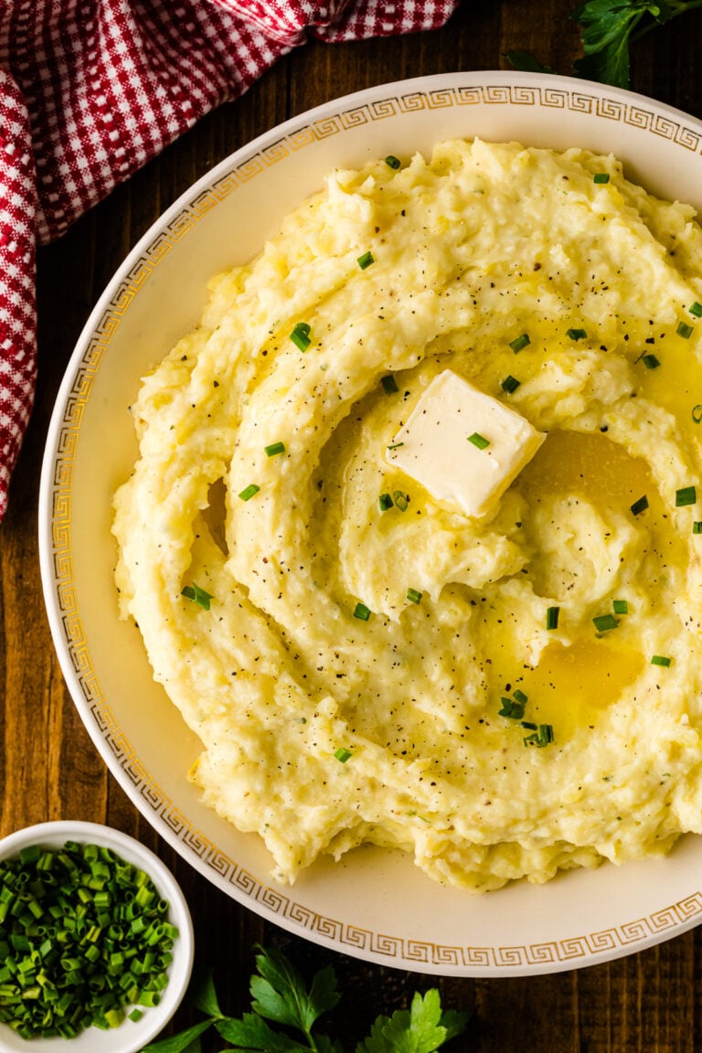 Creamy boursin cheese mashed potatoes in a serving bowl
