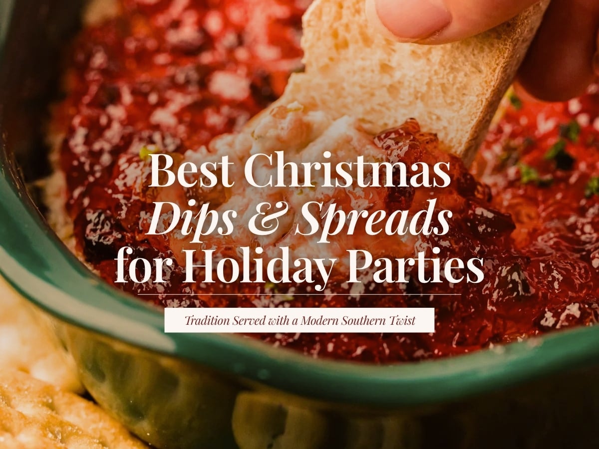 Piece of bread dipping into a warm baked cream cheese dip topped with cranberry sauce in a green dish, with the title ‘Best Christmas Dips & Spreads for Holiday Parties.’