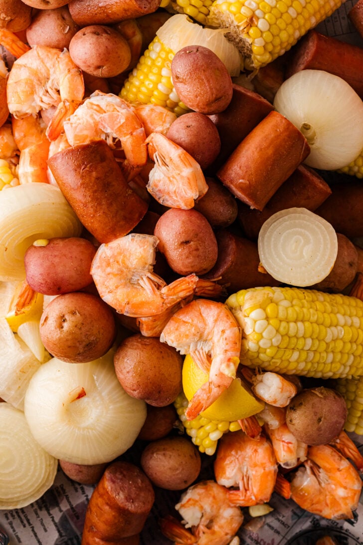 Low country boil with shrimp, sausage, corn, potatoes, and onions.